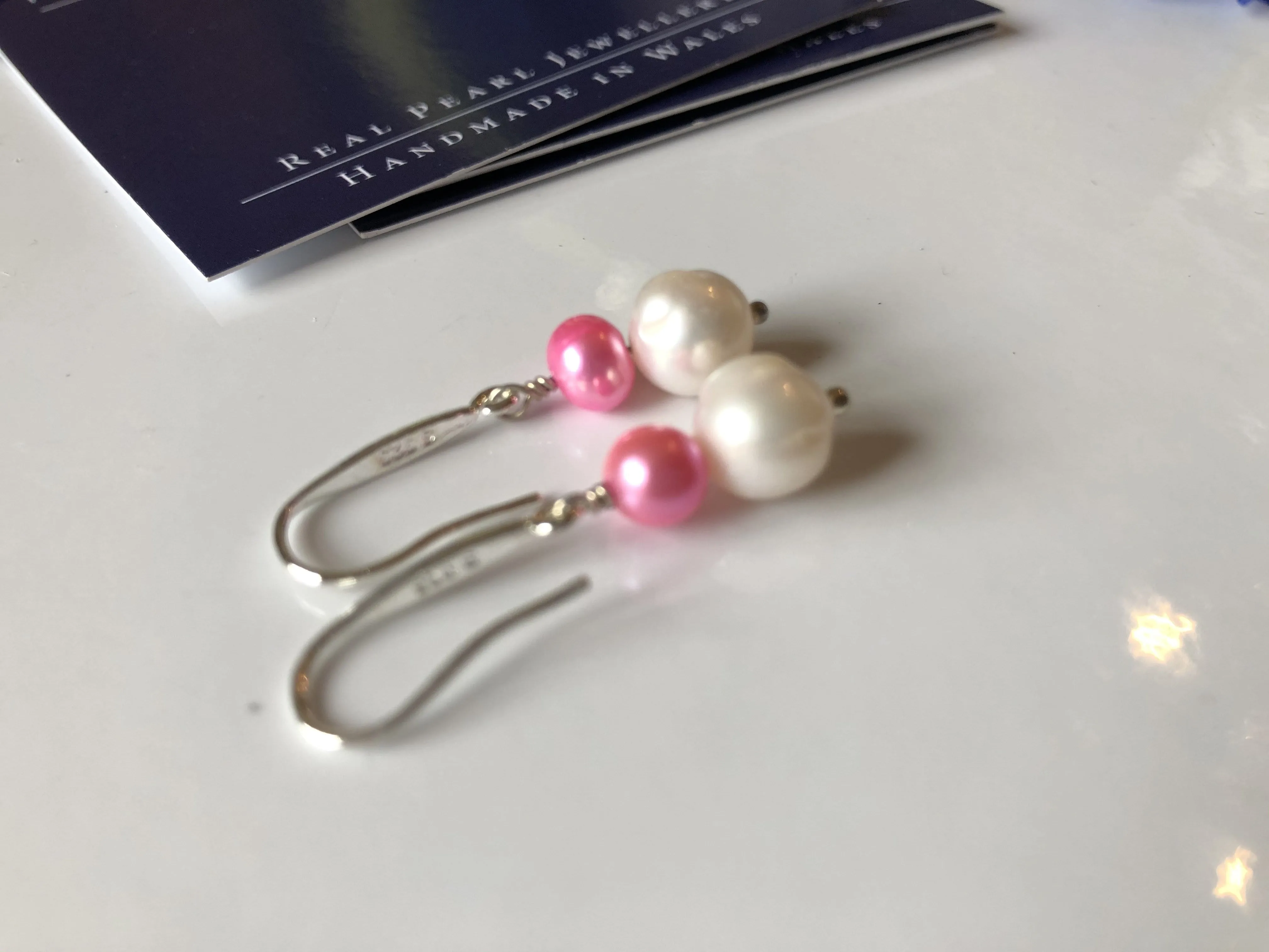 Earrings: Pink and ivory double pearl drop earrings