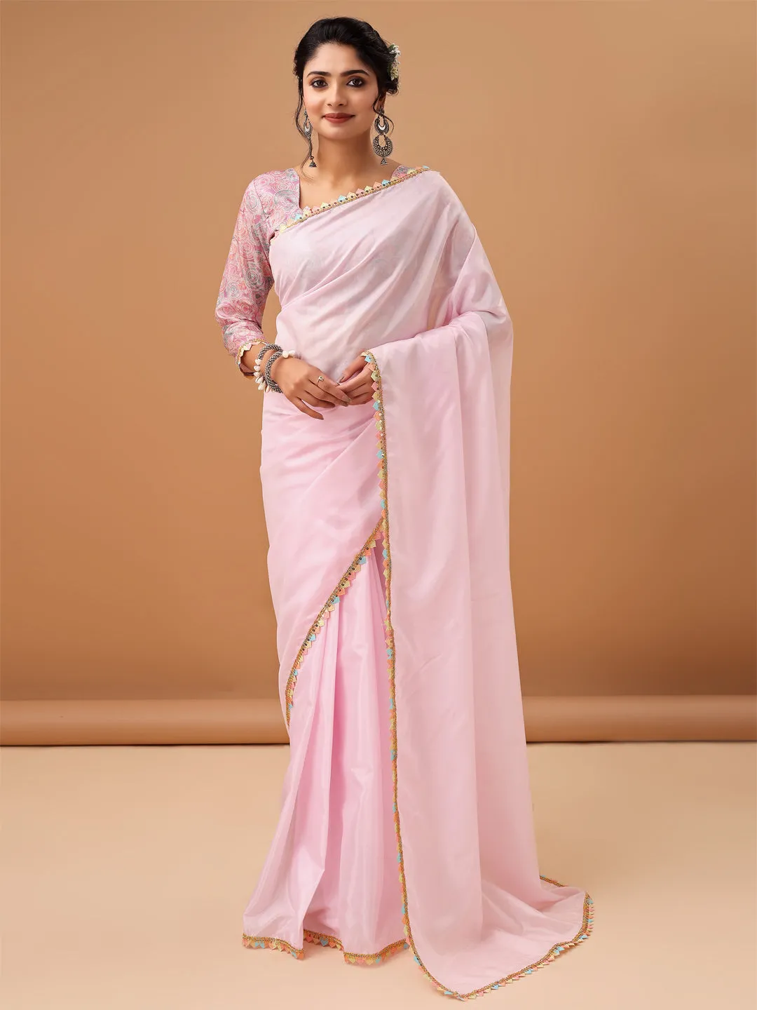 Elegant Pastel Pink Saree with Printed Blouse and Embroidered Clutch