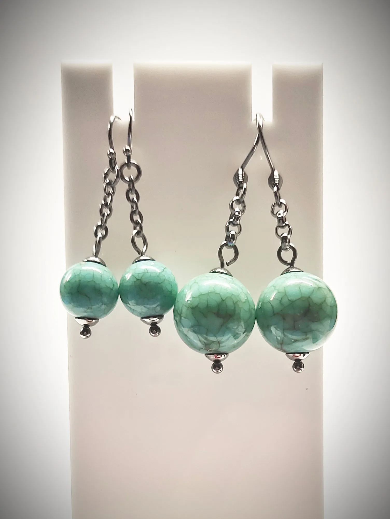 Matching greenish turquoise colour bead earrings for mother and daughter
