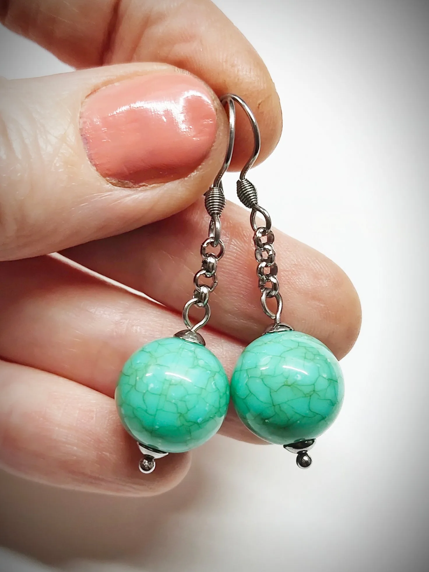 Matching greenish turquoise colour bead earrings for mother and daughter