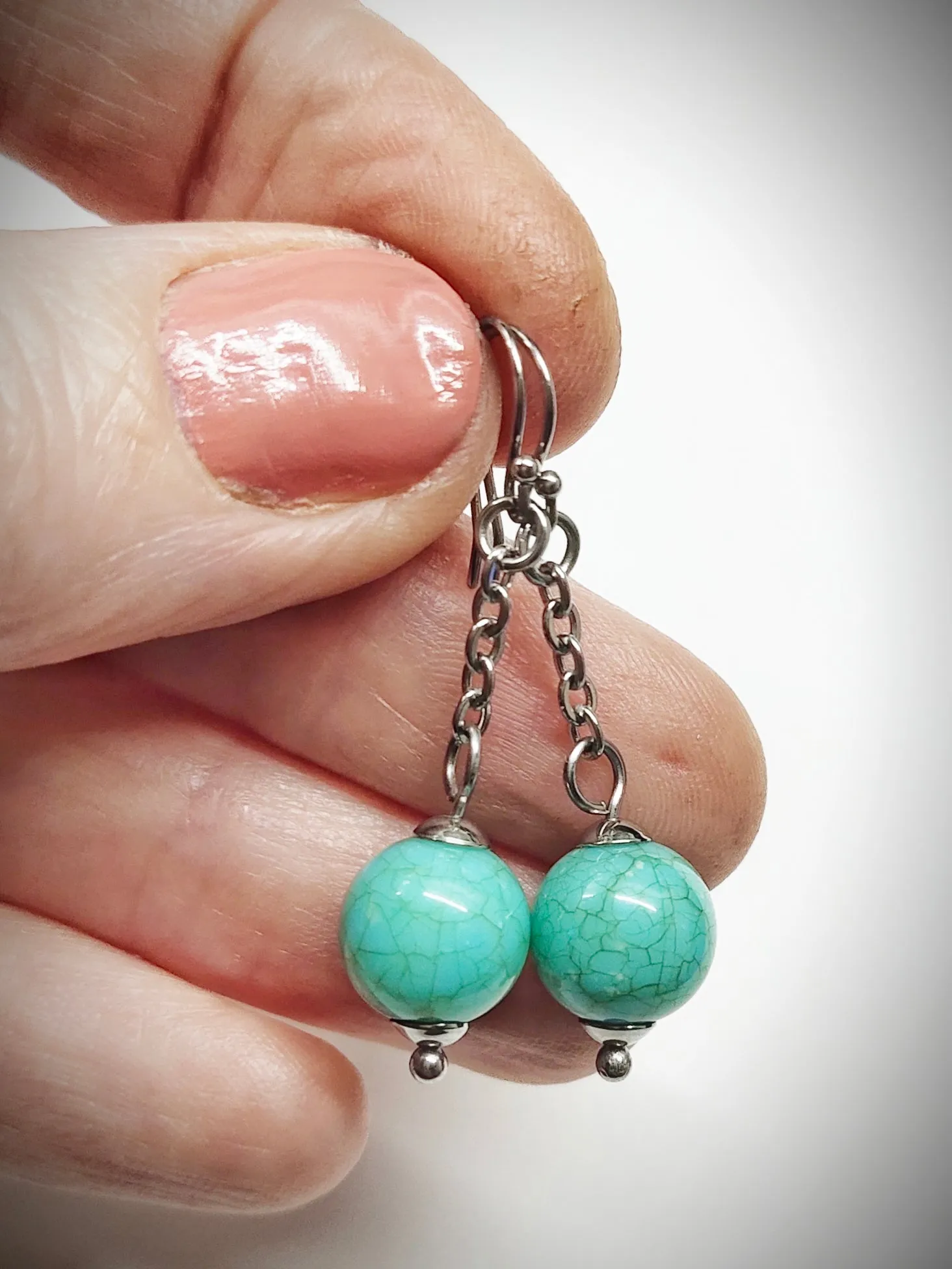 Matching greenish turquoise colour bead earrings for mother and daughter
