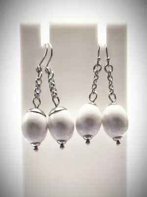Matching off-white oval beads earrings for mother and daughter