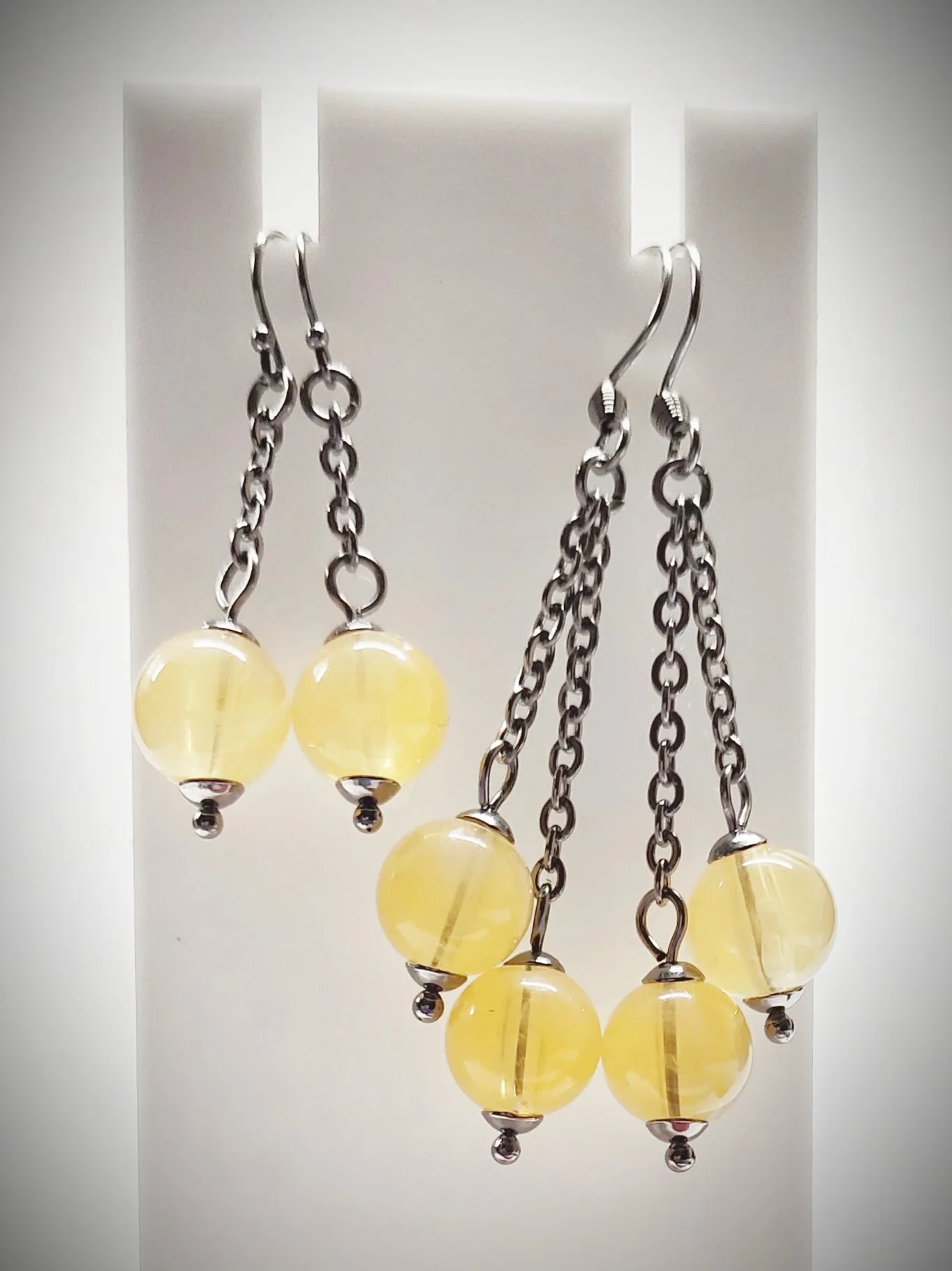 Matching semi clear yellowish bead earrings for mother and daughter