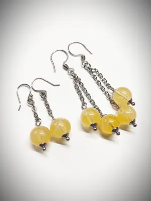 Matching semi clear yellowish bead earrings for mother and daughter