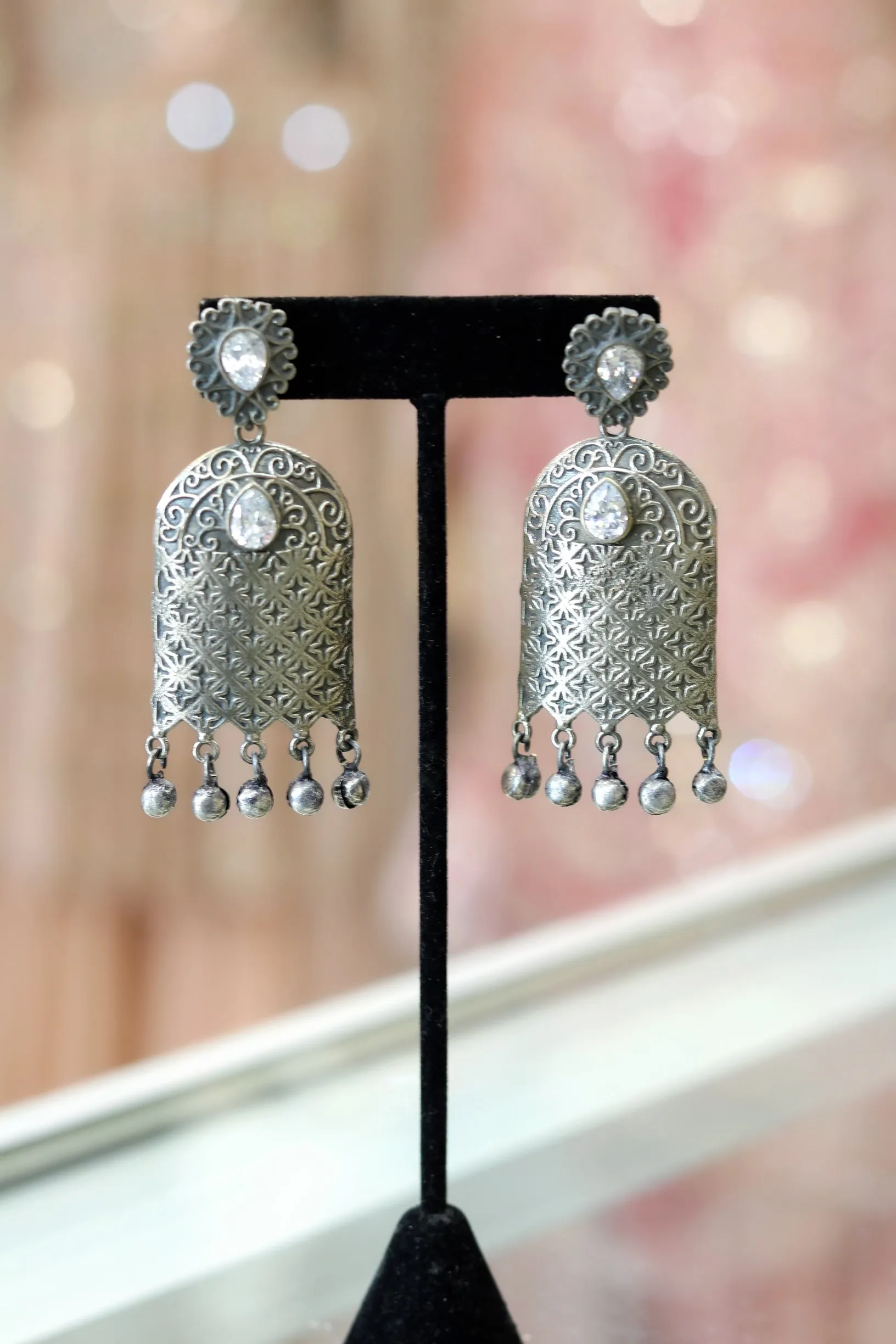 Unique oxidized earrings with clear stone